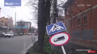 Sign hits man after car hits sign [upl. by Skolnik]