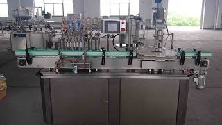 aerosol cans spray bottles linear filling machine rotary capping automatic line for liquid spraying [upl. by Leesa]