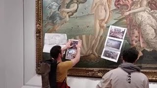 Il video del blitz di Ultima Generazione agli Uffizi di Firenze ricoperta la teca della Venere [upl. by Nueovas]