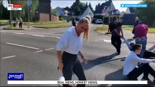 Woman dubbed ‘brutal blonde’ for aggressive treatment of climate protestors [upl. by Atazroglam]