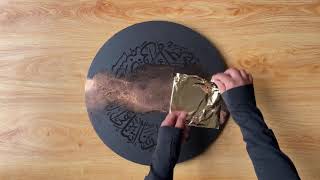 Applying gold leaf to Arabic calligraphy canvas  gilding process final step [upl. by Asiruam]