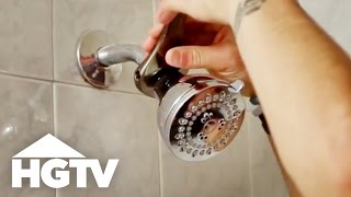 How to Change a Showerhead  At Home Tips  HGTV [upl. by Ellehsat]