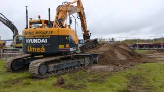 Hyundai Robex 235LCR9 with Engcon EC226  Load Up North 2013 [upl. by Annaoi71]