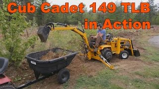 Cub Cadet 149 Garden Tractor Loader Backhoe at Work [upl. by Ahsien]