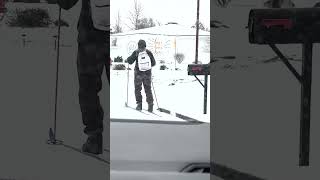 Person Uses Skis to Traverse Snow Covered Streets  1481678 [upl. by Rena924]