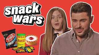 Zac Efron Tries British Snacks For First Time  Snack Wars  LADbible​ [upl. by Anelyak490]