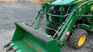 Using the John Deere 1023E to Move and Grade Dirt [upl. by Lede]