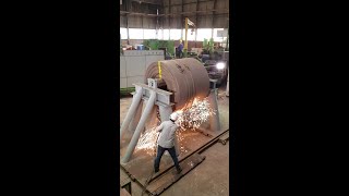 Steel coil opening experiment to demonstrate springback effect [upl. by Enelam]