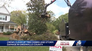 Crews hard at work pulling tree debris from the sides of Greenville roads [upl. by Rochell]