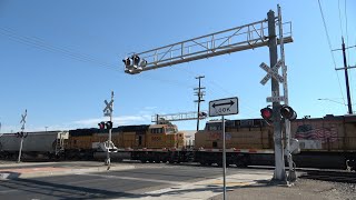 UP 9063 Grain Train With BNSF SD70MAC SouthEast  E Hazelton Ave Railroad Crossing Stockton CA [upl. by Sitoel]