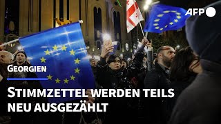 Stimmzettel in Georgien werden teilweise neu ausgezählt  AFP [upl. by Tawnya]