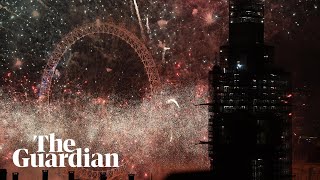 Londons Big Ben rings in the new year and fireworks light up the sky [upl. by Sherlocke]