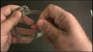 How to Open Handcuffs with a Drinking Straw [upl. by Sacks560]