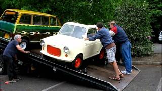 The Vespa 400 microcar gets loaded [upl. by Namurt]