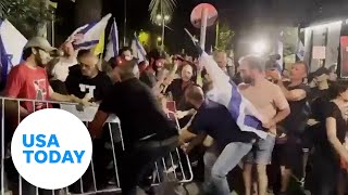 Protesters in Israeli clash with police while demanding the release of hostages  USA TODAY [upl. by Tshombe439]