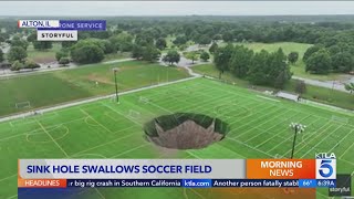 Massive sinkhole swallows soccer fields light pole [upl. by Nodanrb163]