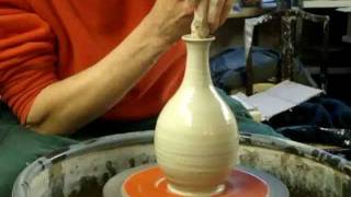 Making a simple clay pottery Olive Oil Pouring Bottle on the Wheel [upl. by Ocirnor]