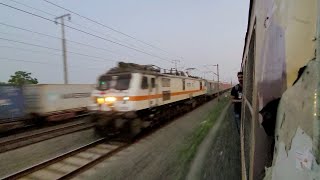 HWH WAP7 30522 leads 12301 Howrah RAJDHANI parallely overtakes 36085 Masagram EMU at 130KMPH [upl. by Enyaz331]