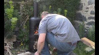 Propane Tank Chimenea wood burning stove with wood store [upl. by Ahsienet]