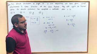 Two simple pendulums of length 1 m and 16 m respectively are both given small displacements in the [upl. by Shiekh]