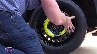 How to Change a Tire A StepbyStep Guide— Carscom [upl. by Avek]