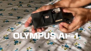 Loading a 35mm Film Camera Olympus AF1 [upl. by Alessandro]