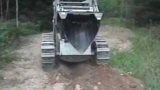 DIRT WORKS Skid Steer Tree Shovel [upl. by Corvin]