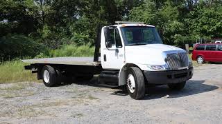 2006 International 4300 DT466 rollback flatbed towtruck For Sale at Auction [upl. by Whitebook25]