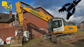 House Demolition with modern hydraulic excavator LIEBHERR 926 tearing down old house 1 [upl. by Anoynek]