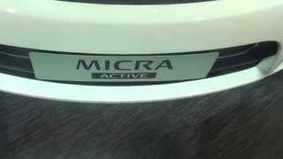 Nissan Micra Active XV Pure Drive in White at 12th Auto Expo 2014 Greater Noida [upl. by Leahcimsemaj]