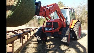 White Creek Cattle  Kubota M110x Tractor Moving Hay [upl. by Eisenstark]