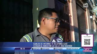 Calle José Riofrío Cables de internet y telefonía casi llegan hasta el suelo [upl. by Eimilb]