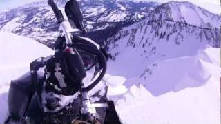 2012 ski doo summit X close call with cliff fall [upl. by Elnukeda523]