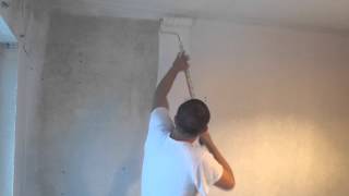 How to paint new plaster with a roller [upl. by Berlyn]