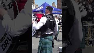 Tenor drummers mallets spin as Dunnottar Pipe and Drums play Loch Lomond at Stonehaven shorts [upl. by Nitsed]