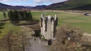 Aerial view around Braemar Castle in the Cairngorms Royal Deeside Scotland [upl. by Asserak394]