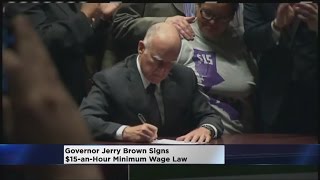 Gov Brown Signs 15Hr Minimum Wage Into Law [upl. by Arraet]