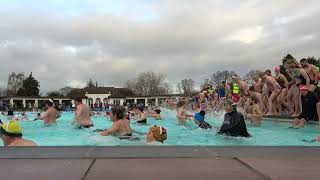 UK swimmers brave cold waters in Christmas Day plunge in Gloucestershire [upl. by Brice]