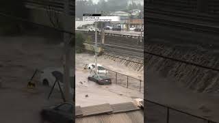 Car Washes Away during San Diego Flooding [upl. by Akiemat]