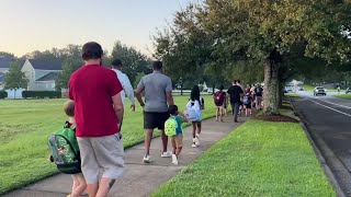 Fathers and father figures join Southeast Tallahassee kids for Walking School Bus [upl. by Yenffit776]