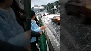 Cars crash and pile up on snowy road as people cling to median [upl. by Nodnek]