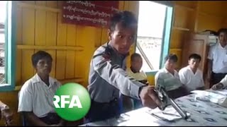 Gunwaving police officer goes viral in Myanmar [upl. by Metah]