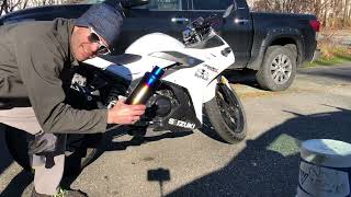 Installing aftermarket exhaust on Suzuki GSX250R [upl. by Brear]