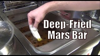 Eating a DeepFried Mars Bar in Edinburgh Scotland [upl. by Parry]