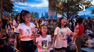 Taylor Swift in Singapore Fans outside the National Stadium sing along with the concert [upl. by Cannell]