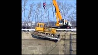 Crane Lowering Dozer Into Pit  Fairly Smooth Technique [upl. by Dnalhsa]