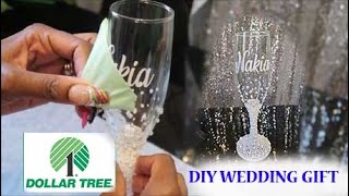 DIY DOLLAR TREE BLING TOASTING FLUTE WEDDING GIFT HOW TO ADD VINYL amp PEARLS TO CHAMPAGNE GLASS [upl. by Shirah]