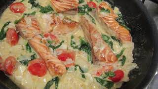 Creamy Tuscan Salmon with Spinach and Cherry Tomatoes [upl. by Aivle]