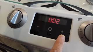 AEG  Electrolux  Zanussi  Cooker clock  Setting the time  V1 0 [upl. by Nahrut757]