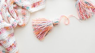 How to make a yarn TASSEL amp attach it to a project [upl. by Eisse]